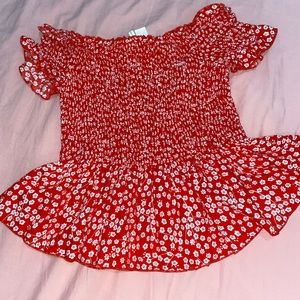 Red women's blouse with white flowers